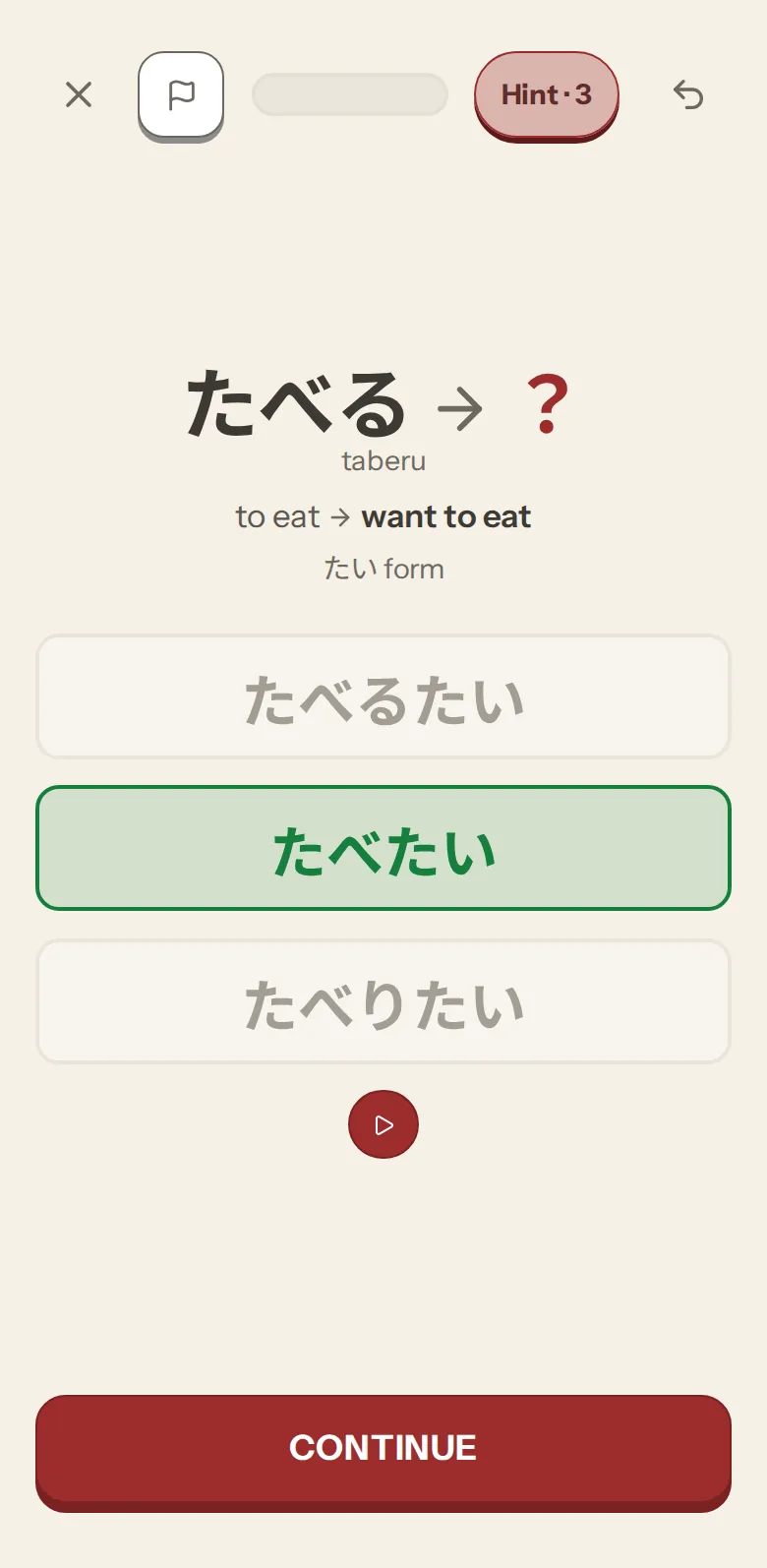 A lesson question on iPhone: たべる to たべたい, with the right answer marked green